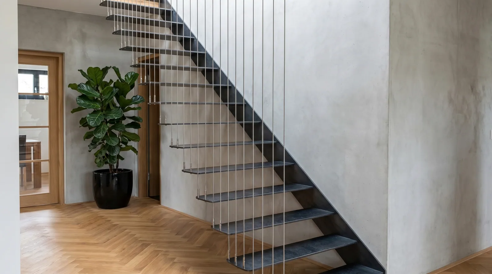 Escalier suspendu avec garde-corps câbles inox · réalisation Erminox